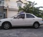 Mazda 323 1997 - Cần bán Mazda 323 đời 1997, màu trắng, nhập khẩu nguyên chiếc, 90 triệu