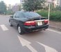 Mazda 626   2002 - Cần bán xe Mazda 626 sản xuất năm 2002, màu đen, 135tr