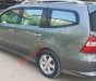 Nissan Grand livina   2010 - Bán Nissan Grand livina sản xuất 2010, màu xám, xe gia đình 