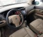 Nissan Grand livina   2010 - Bán Nissan Grand livina sản xuất 2010, màu xám, xe gia đình 