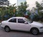 Mazda 323 1999 - Cần bán gấp Mazda 323 sản xuất năm 1999, màu trắng, nhập khẩu