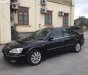 Ford Mondeo 2.5 AT 2005 - Chính chủ bán ô tô Ford Mondeo 2.5 AT 2005, màu đen