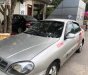 Daewoo Lanos SX 2004 - Bán ô tô Daewoo Lanos SX sản xuất năm 2004, màu bạc