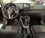 Mazda 2 2016 - Bán xe Mazda 2 1.5AT đời 2016, màu kem (be), 475tr