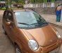 Daewoo Matiz 2004 - Gia đình bán ô tô Daewoo Matiz năm sản xuất 2004, màu nâu 