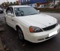 Daewoo Magnus 2004 - Cần bán lại xe Daewoo Magnus đời 2004, màu trắng, số tự động