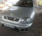 Daewoo Lanos SX 2002 - Bán xe Daewoo Lanos SX sản xuất 2002, màu bạc