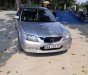 Mazda 323   2002 - Cần bán Mazda 323 sản xuất năm 2002, màu bạc, giá chỉ 149 triệu