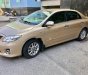 Toyota Corolla 2011 - Bán xe Toyota Corolla sản xuất 2011, màu vàng, xe nhập