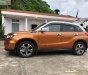Suzuki Vitara   2016 - Bán Suzuki Vitara 1.6 AT sản xuất năm 2016, màu vàng, nhập khẩu  