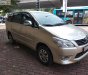 Toyota Innova 2013 - Bán Toyota Innova 2.0E đời 2013, màu vàng, số sàn 