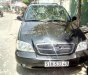 Kia Carnival 2009 - Bán Kia Carnival GS 2.5 AT đời 2009, màu đen, chính chủ 