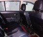 Nissan Tiida 2010 - Cần bán Nissan Tiida 1.6 AT đời 2010, màu đỏ, xe nhập, chính chủ 