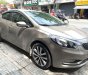 Kia K3 2014 - Bán Kia K3 sản xuất năm 2014, màu vàng số tự động, giá 482tr