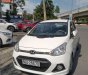 Hyundai Grand i10 2016 - Bán ô tô Hyundai Grand i10 1.2 AT năm 2016, màu trắng, nhập khẩu nguyên chiếc số tự động