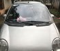 Daewoo Matiz  MT 2004 - Cần bán lại xe Daewoo Matiz MT đời 2004, màu bạc