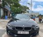 BMW 3 Series 2014 - Bán xe BMW 3 Series 320i đời 2014, màu đen