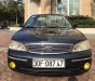 Ford Laser 2004 - Bán Ford Laser năm 2004, màu đen chính chủ, 148tr