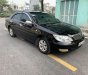 Toyota Camry 2003 - Cần bán gấp Toyota Camry đời 2003, màu đen số sàn, 258tr