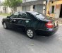 Toyota Camry 2003 - Cần bán gấp Toyota Camry đời 2003, màu đen số sàn, 258tr