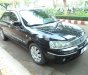 Ford Laser 2004 - Cần bán xe Ford Laser 1.8AT 2004, màu đen như mới giá tốt