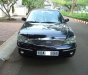 Ford Laser 2004 - Cần bán xe Ford Laser 1.8AT 2004, màu đen như mới giá tốt