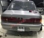 Mazda 323 1995 - Cần bán xe Mazda 323 đời 1995, màu bạc chính chủ, 52 triệu, xe máy còn êm