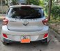 Hyundai Grand i10 2015 - Cần bán gấp Hyundai Grand i10 sản xuất năm 2015, màu trắng, xe nhập chính hãng