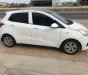 Hyundai Grand i10    MT 2014 - Cần bán Hyundai Grand i10 MT sản xuất 2014, màu trắng, nhập khẩu xe gia đình