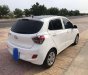 Hyundai Grand i10    MT 2014 - Cần bán Hyundai Grand i10 MT sản xuất 2014, màu trắng, nhập khẩu xe gia đình