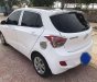 Hyundai Grand i10    MT 2014 - Cần bán Hyundai Grand i10 MT sản xuất 2014, màu trắng, nhập khẩu xe gia đình