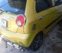 Chevrolet Spark 2009 - Cần bán xe Chevrolet Spark sản xuất 2009, màu vàng xe gia đình