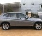 BMW X1   2010 - Cần bán xe BMW X1 sản xuất 2010, màu xám, nhập khẩu