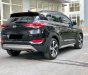 Hyundai Tucson   2018 - Cần bán Hyundai Tucson đời 2018, màu đen còn mới, giá tốt