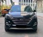 Hyundai Tucson   2018 - Cần bán Hyundai Tucson đời 2018, màu đen còn mới, giá tốt