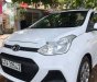 Hyundai Grand i10 2015 - Cần bán gấp Hyundai Grand i10 đời 2015, màu trắng, xe nhập xe gia đình