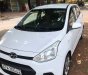 Hyundai Grand i10 2015 - Cần bán gấp Hyundai Grand i10 đời 2015, màu trắng, xe nhập xe gia đình