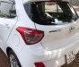 Hyundai Grand i10 2015 - Cần bán gấp Hyundai Grand i10 đời 2015, màu trắng, xe nhập xe gia đình