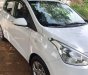 Hyundai Grand i10 2015 - Cần bán gấp Hyundai Grand i10 đời 2015, màu trắng, xe nhập xe gia đình