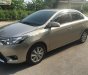 Toyota Vios 2018 - Cần bán gấp Toyota Vios 1.5E năm 2018, màu vàng, xe gia đình