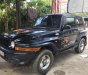 Ssangyong Korando 2000 - Cần bán Ssangyong Korando năm 2000, màu đen, xe nhập, giá tốt