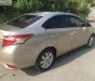 Toyota Vios 2018 - Cần bán gấp Toyota Vios 1.5E năm 2018, màu vàng, xe gia đình