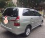 Toyota Innova 2014 - Cần bán gấp Toyota Innova sản xuất năm 2014, màu bạc