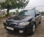 Mazda 323 2002 - Cần bán lại xe Mazda 323 sản xuất 2002, màu đen xe nguyên bản