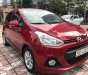 Hyundai Grand i10   1.2 AT 2016 - Cần bán lại xe Hyundai Grand i10 1.2 AT đời 2016, màu đỏ, xe nhập