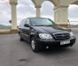 Kia Carnival 2.4 2009 - Bán Kia Carnival 2.4 sản xuất năm 2009, màu đen xe gia đình, 245tr