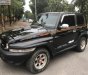 Ssangyong Korando 2004 - Bán xe Ssangyong Korando TX5 AT 4WD năm 2004, màu đen, xe nhập