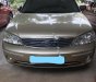 Ford Laser 2003 - Cần bán xe Ford Laser năm 2003, màu vàng số tự động