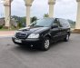 Kia Carnival 2.4 2009 - Bán Kia Carnival 2.4 sản xuất năm 2009, màu đen xe gia đình, 245tr