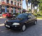 Ford Laser 2000 - Bán ô tô Ford Laser sản xuất năm 2000, màu đen xe còn mới